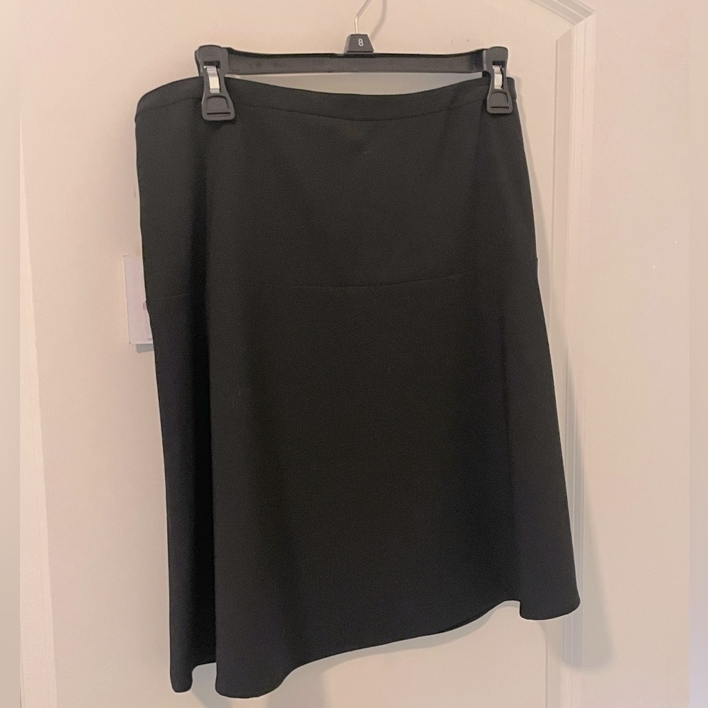 Calvin Klein professional black shirt, hits just above the knee